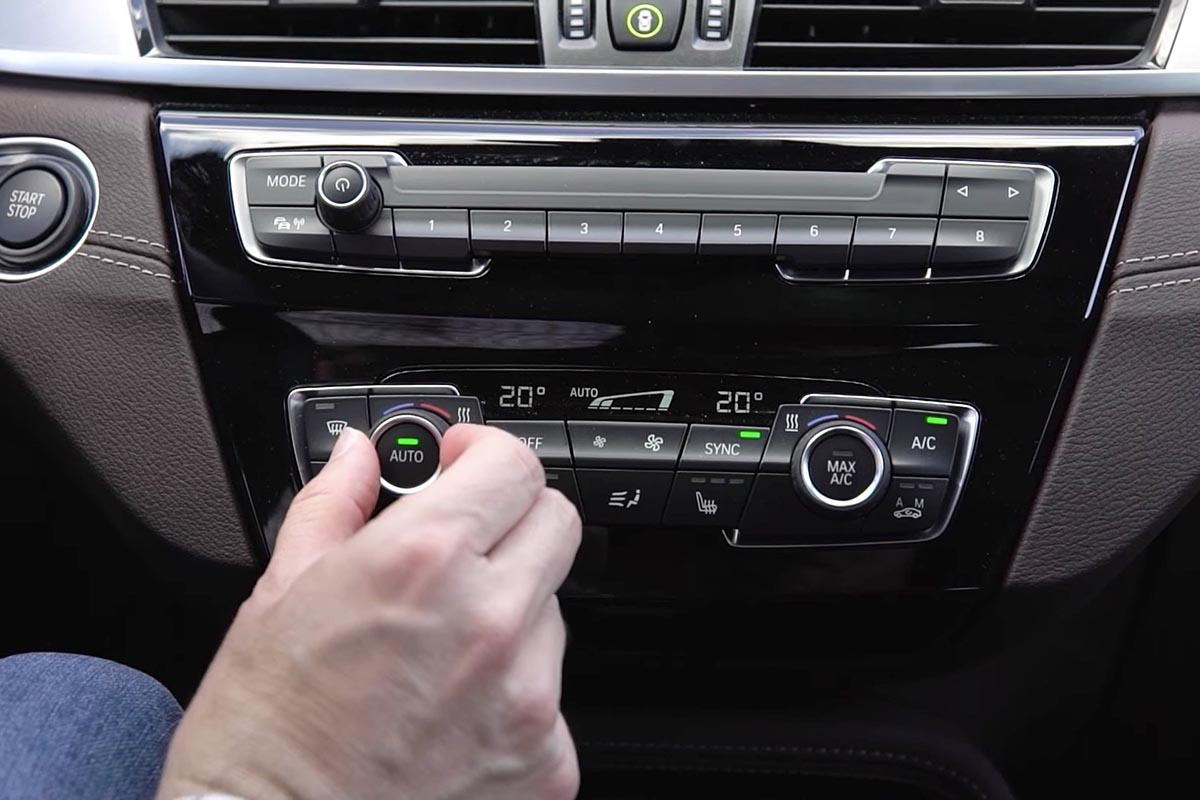Bouton recirculation air climatisation voiture mal utilisé causant problèmes santé rhumes grippes conducteurs